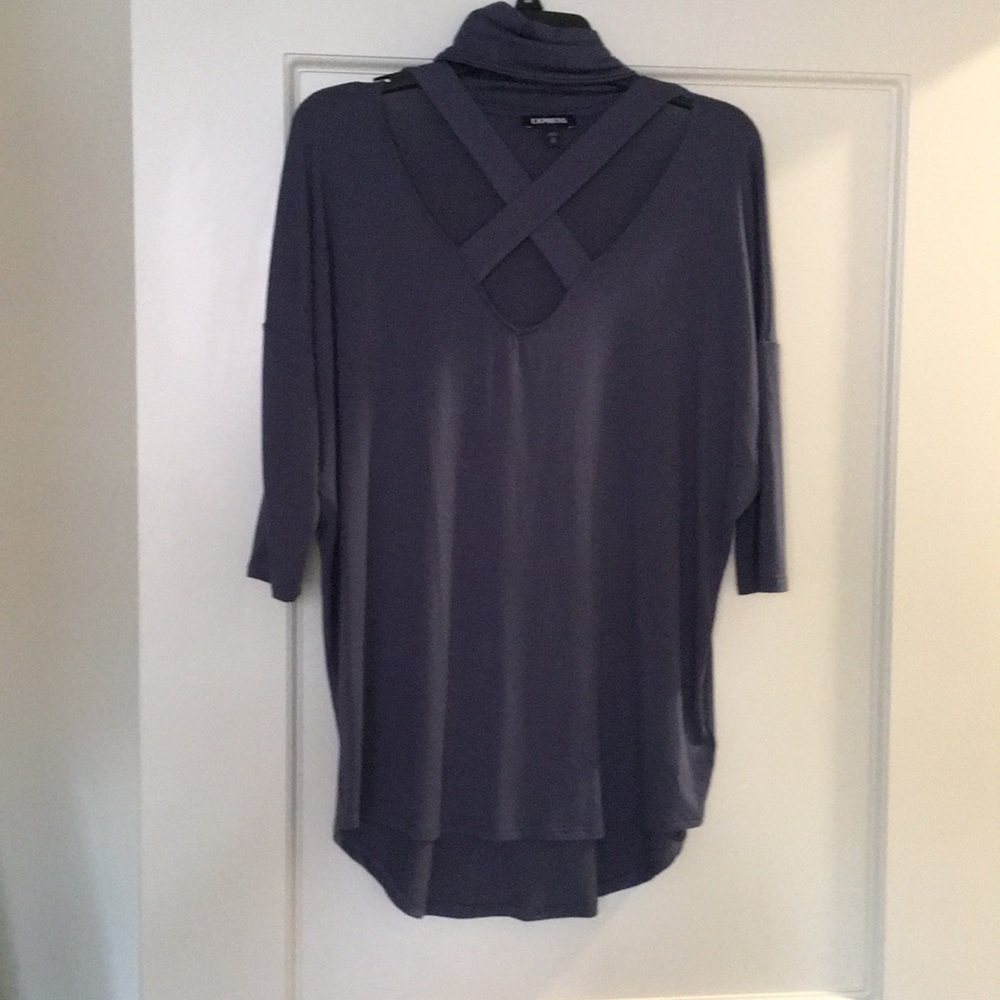 Blue three quarter length sweater.